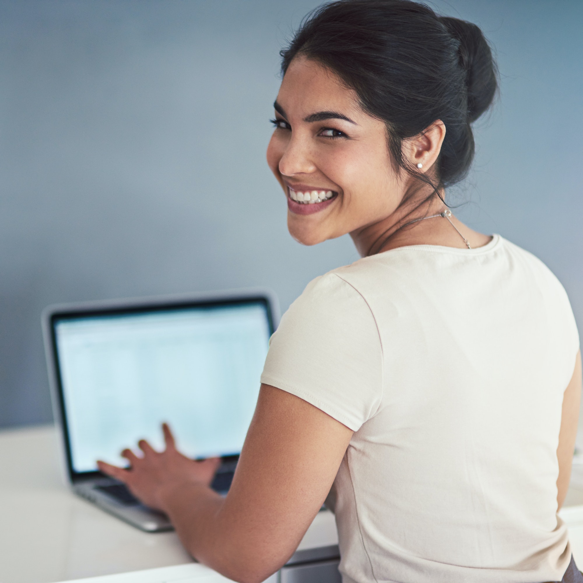 Cropped portrait of an attractive young businesswoman working on a laptop in her office