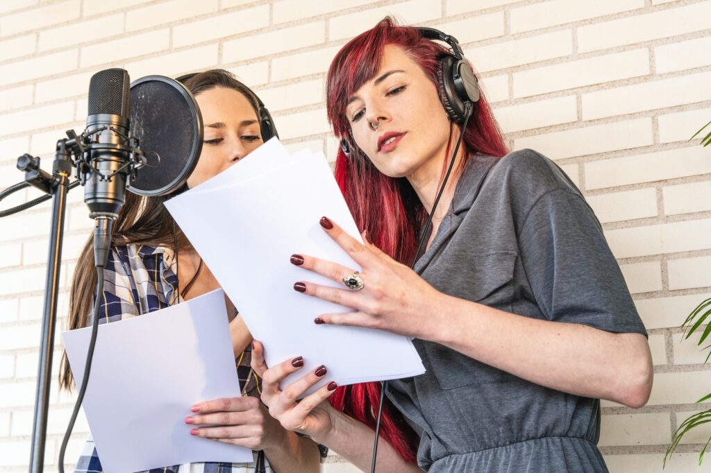 Young women preparing for podcast
